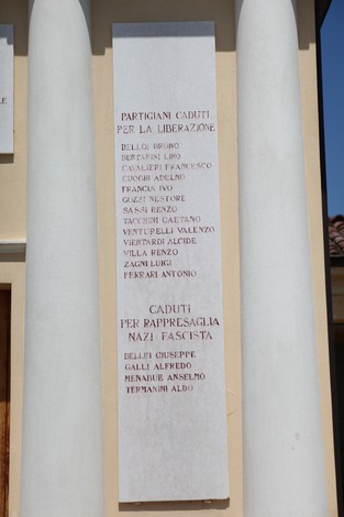 Sacrario dei Caduti per la Liberazione, monumento commemorativo con nomi di partigiani e caduti per la libertà.
