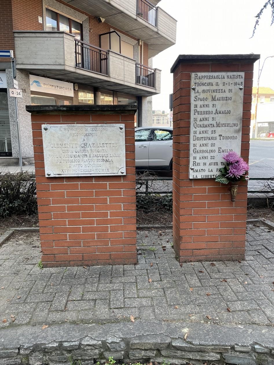 Lapide commemorativa in memoria delle vittime dell'eccidio di Regina Margherita. Ricordo e rispetto per i caduti.