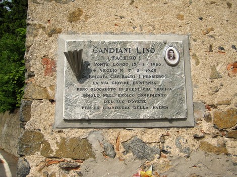 Lapide commemorativa dedicata a Lino Candiani, riflette il suo sacrificio e la sua eroica memoria.