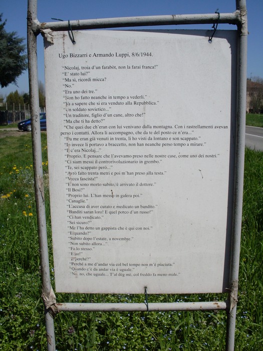Cippo commemorativo dedicato a Ugo Bizzarri e Armando Luppi, con citazioni significative sulla libertà e la memoria.