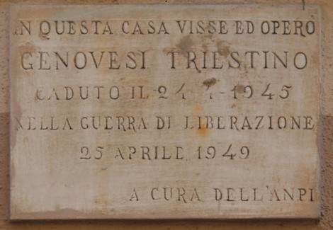 Lapide commemorativa dedicata a Genovesi, vittima della guerra di liberazione, situata su una parete.