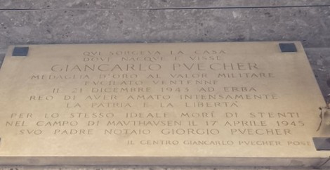 Lapide commemorativa dedicata a Giancarlo Puecher, in memoria del suo sacrificio per la patria e la libertà.