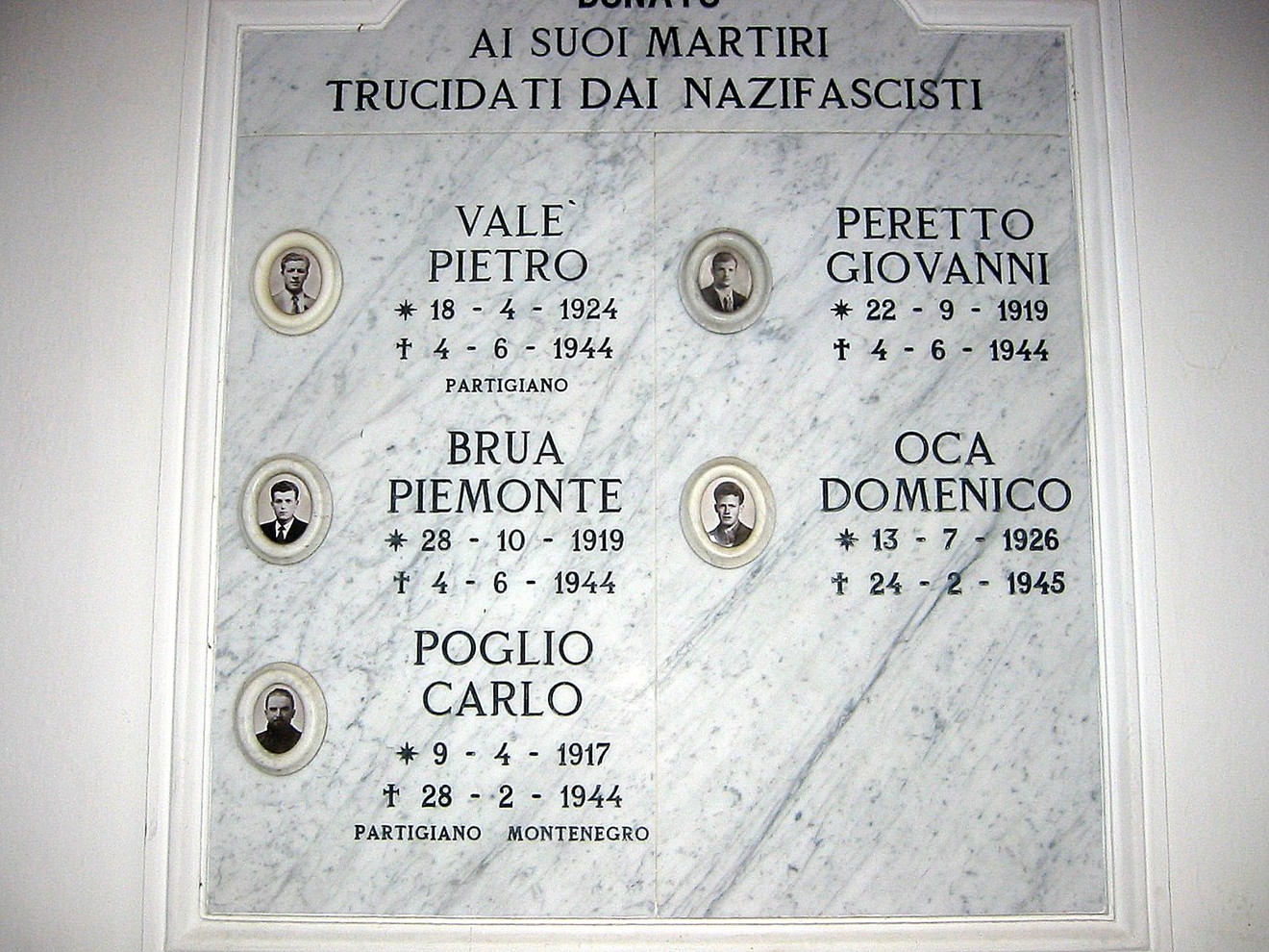 Lapide commemorativa ai caduti per la libertà, dedicata a martiri trucidati dai nazifascisti.