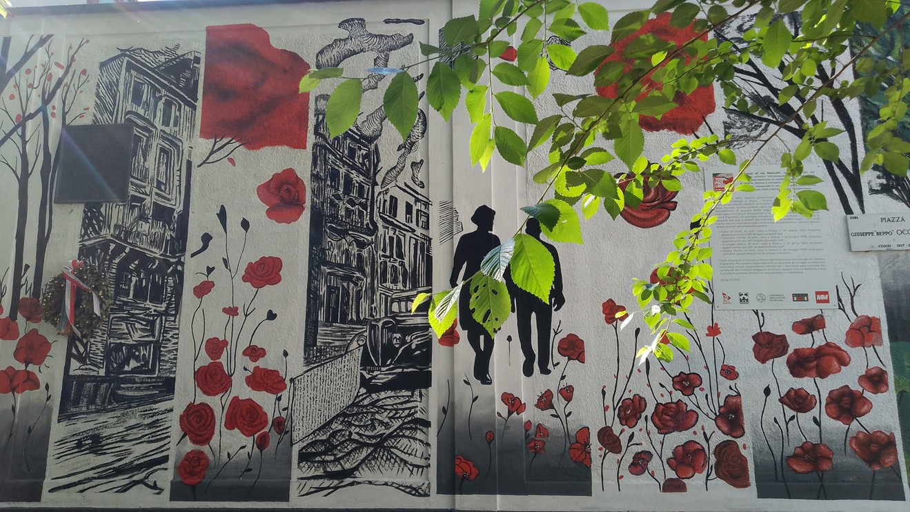 Murale colorato che rappresenta figure umane circondate da papaveri, evocando un'atmosfera vibrante e nostalgica.