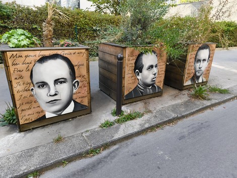 Rappresentazione commemorativa del Gruppo Manouchian, con volti e scritte significative.